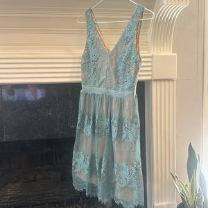 Beautiful dress small size goes with tennis sandals or heels.My tee wore it once